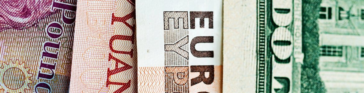 Close-up of bank notes in different currencies