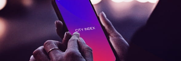 Someone using City Index trading app