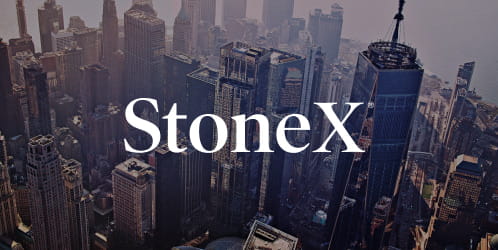 StoneX logo over buildings in city